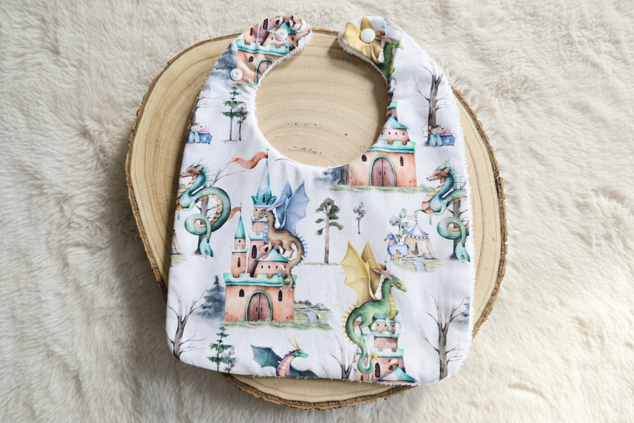 Bavoir classique dragons châteaux